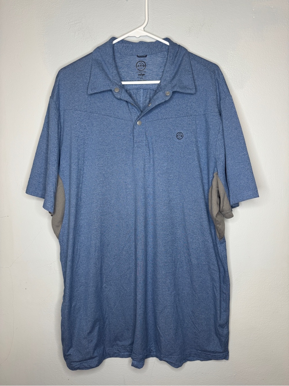 ATG Wrangler Men's Performance Polo in Heather Blue with Subtle Logo